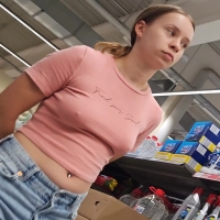 Braless grocery store girl