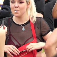 Blonde in see through top