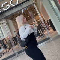 Blonde in black dress
