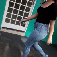 Brunette girl in jeans