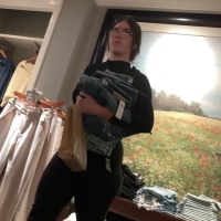 Brunette clothing store employee
